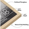 image:imageAmericanflat 24x30 Poster Frame  Slim Molding  Black  Polished plexiglass front hangs vertical or horizontal sawtooth hangers included secure turntab backingNatural Oak