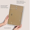 image:imageAmericanflat 24x30 Poster Frame  Slim Molding  Black  Polished plexiglass front hangs vertical or horizontal sawtooth hangers included secure turntab backingWhite