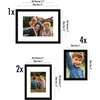 image:imageAmericanflat 7 Piece Black Gallery Wall Picture Frame Set with Mats in 12x16 9x12 and 6x8  Composite Wood with Shatter Resistant Glass  Horizontal and Vertical Formats for Wall and Tabletop  Shatterresistant glass hanging hardware included mixedsize wall gallery set