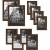image:imageAmericanflat Set of 10 Picture Frames with ShatterResistant Glass  Gallery Wall Frame Set with Two 8x10 Four 5x7 and Four 4x6 Frames  Signature Collection  Driftwood  Includes two 8x10 four 5x7 and four 4x6 shatterresistant glass hanging hardware includedWalnut