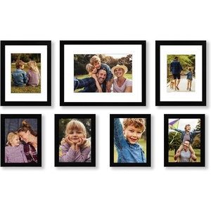image:imageAmericanflat 7 Piece Black Gallery Wall Picture Frame Set with Mats in 12x16 9x12 and 6x8  Composite Wood with Shatter Resistant Glass  Horizontal and Vertical Formats for Wall and Tabletop  Shatterresistant glass hanging hardware included mixedsize wall gallery set