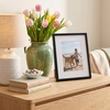 image:imageAmericanflat 8x10 Picture Frame with ShatterResistant Glass  Use as 5x7 Frame with Mat or Display 8x10 Photo Without Mat  Streamline Collection  Picture Frames for Tabletop and Wall  White  Shatterresistant glass wall or tabletop display with included easel sawtooth hangers included secure turntab backingBlack
