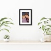 image:imageAmericanflat 8x10 Picture Frame with ShatterResistant Glass  Use as 5x7 Frame with Mat or Display 8x10 Photo Without Mat  Streamline Collection  Picture Frames for Tabletop and Wall  White  Shatterresistant glass wall or tabletop display with included easel sawtooth hangers included secure turntab backingBlack