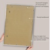 image:imageAmericanflat 8x10 Picture Frame with ShatterResistant Glass  Use as 5x7 Frame with Mat or Display 8x10 Photo Without Mat  Streamline Collection  Picture Frames for Tabletop and Wall  White  Shatterresistant glass wall or tabletop display with included easel sawtooth hangers included secure turntab backingSilver