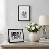 image:imageAmericanflat 8x10 Picture Frame with ShatterResistant Glass  Use as 5x7 Frame with Mat or Display 8x10 Photo Without Mat  Streamline Collection  Picture Frames for Tabletop and Wall  White  Shatterresistant glass wall or tabletop display with included easel sawtooth hangers included secure turntab backingBlack