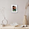 image:imageAmericanflat 8x10 Picture Frame with ShatterResistant Glass  Use as 5x7 Frame with Mat or Display 8x10 Photo Without Mat  Streamline Collection  Picture Frames for Tabletop and Wall  White  Shatterresistant glass wall or tabletop display with included easel sawtooth hangers included secure turntab backingSilver