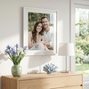 image:imageAmericanflat 8x10 Picture Frame with ShatterResistant Glass  Use as 5x7 Frame with Mat or Display 8x10 Photo Without Mat  Streamline Collection  Picture Frames for Tabletop and Wall  White  Shatterresistant glass wall or tabletop display with included easel sawtooth hangers included secure turntab backingWhite