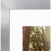 image:imageAmericanflat 8x8 Picture Frame  Matted to 5x5  Engineered Wood  White  Shatterresistant glass wall or tabletop display with included easel sawtooth hangers included secure turntab backingSilver