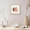 image:imageAmericanflat 8x8 Picture Frame  Matted to 5x5  Engineered Wood  White  Shatterresistant glass wall or tabletop display with included easel sawtooth hangers included secure turntab backingNatural Oak