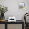 image:imageAmericanflat 8x8 Picture Frame  Matted to 5x5  Engineered Wood  White  Shatterresistant glass wall or tabletop display with included easel sawtooth hangers included secure turntab backingSilver