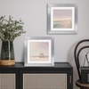 image:imageAmericanflat 8x8 Picture Frame  Matted to 5x5  Engineered Wood  White  Shatterresistant glass wall or tabletop display with included easel sawtooth hangers included secure turntab backingSilver