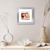 image:imageAmericanflat 8x8 Picture Frame  Matted to 5x5  Engineered Wood  White  Shatterresistant glass wall or tabletop display with included easel sawtooth hangers included secure turntab backingSilver