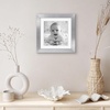 image:imageAmericanflat 8x8 Picture Frame  Matted to 5x5  Engineered Wood  White  Shatterresistant glass wall or tabletop display with included easel sawtooth hangers included secure turntab backingSilver