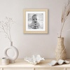 image:imageAmericanflat 8x8 Picture Frame  Matted to 5x5  Engineered Wood  White  Shatterresistant glass wall or tabletop display with included easel sawtooth hangers included secure turntab backingNatural Oak