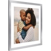 image:imageAmericanflat 8x8 Picture Frame  Matted to 5x5  Engineered Wood  White  Shatterresistant glass wall or tabletop display with included easel sawtooth hangers included secure turntab backingSilver