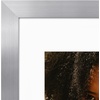 image:imageAmericanflat 8x8 Picture Frame  Matted to 5x5  Engineered Wood  White  Shatterresistant glass wall or tabletop display with included easel sawtooth hangers included secure turntab backingSilver