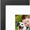 image:imageAmericanflat 8x8 Picture Frame  Matted to 5x5  Engineered Wood  White  Shatterresistant glass wall or tabletop display with included easel sawtooth hangers included secure turntab backingBlack