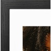 image:imageAmericanflat 8x8 Picture Frame  Matted to 5x5  Engineered Wood  White  Shatterresistant glass wall or tabletop display with included easel sawtooth hangers included secure turntab backingBlack