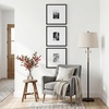 image:imageAmericanflat 18x24 Poster Frame  Matted to 8x10  Slim Molding  Black  Polished plexiglass front hangs vertical or horizontal sawtooth hangers included secure turntab backingBlack