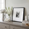 image:imageAmericanflat 18x24 Poster Frame  Matted to 8x10  Slim Molding  Black  Polished plexiglass front hangs vertical or horizontal sawtooth hangers included secure turntab backingBlack